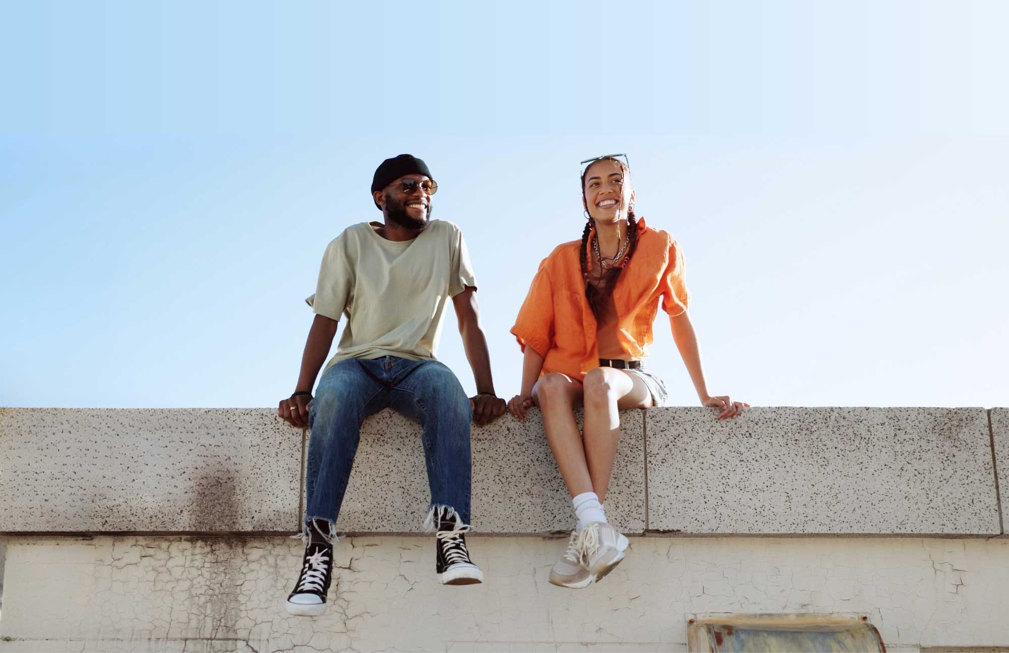 man and woman smiling in addiction treatment