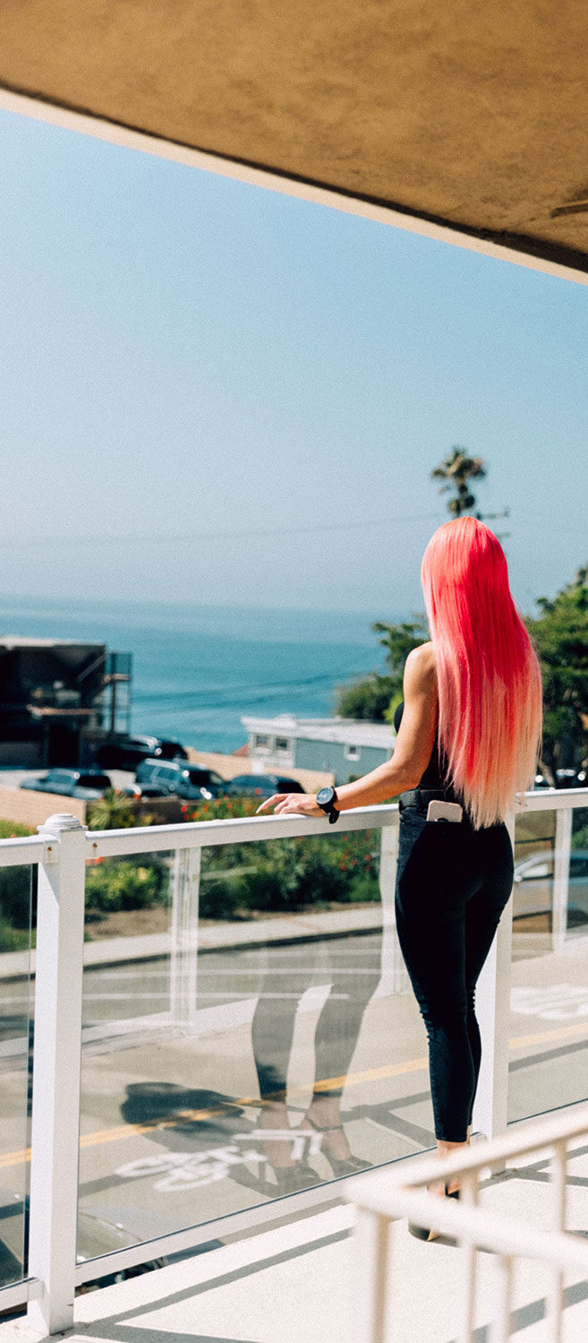 Natalie Eva Marie looking out at Laguna Beach from NEM Recovery